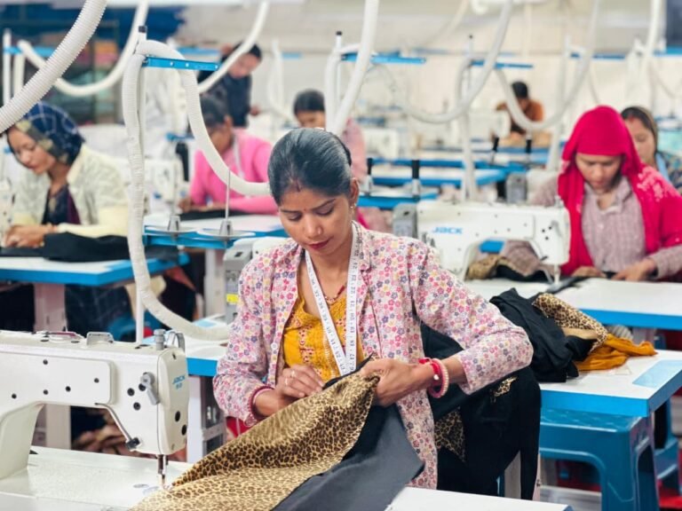 Women stitching at a Sangini production centre