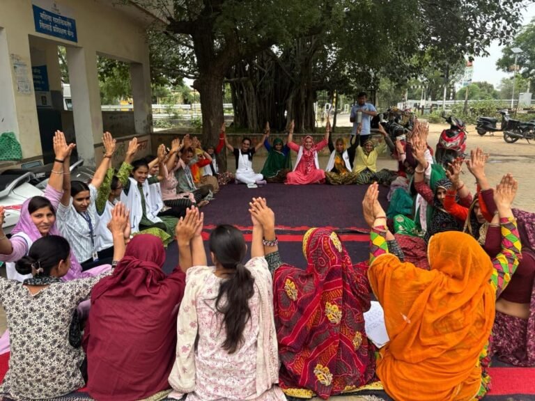Women of a GMVS self-help group meeting together
